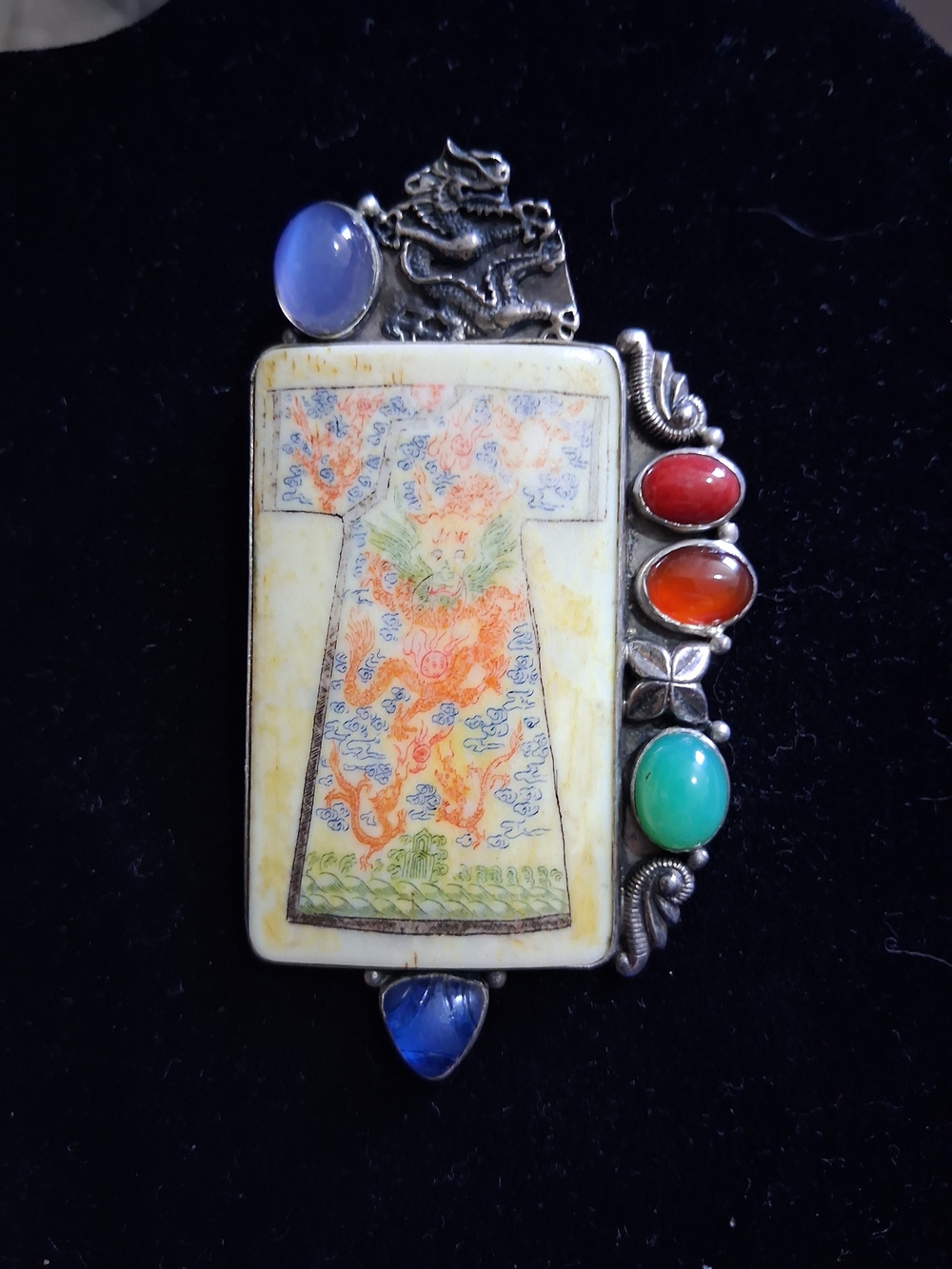 This sterling silver pendant Brooch Dragon by designer Amy Kahn Russell (AKR)